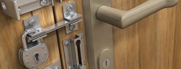 multiple style locks installed on a door