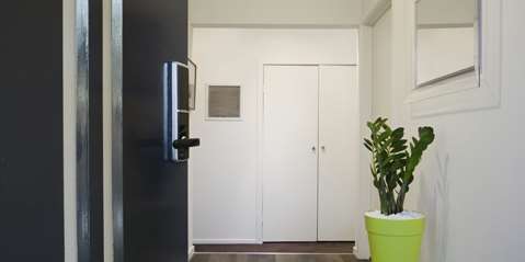 Welcoming contemporary home entrance front door and hallway