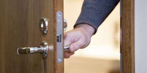 Man opening door