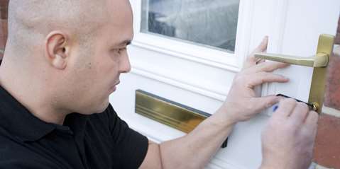 Man picking lock