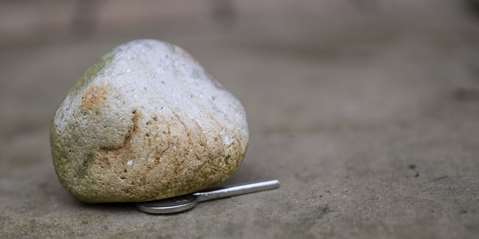 House key hidden under a rock