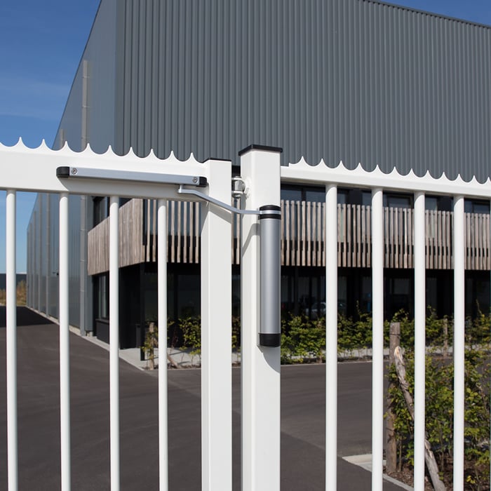 Locinox Lion Compact 90° or 180° Retrofit Gate Closer in Silver on White Gate