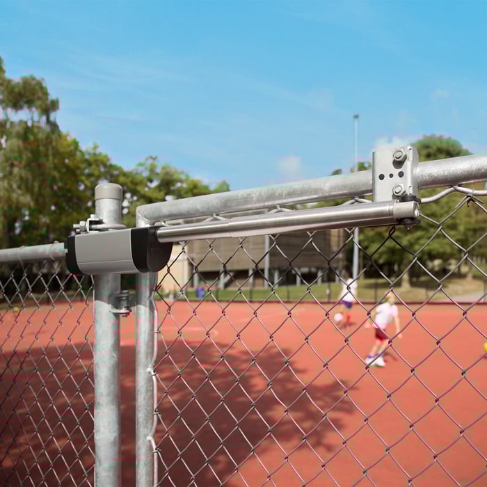 Locinox Samson Hydraulic Gate Closer in Silver on Chain Link Gate (Requires mounting brackets for round post, chain link applications, sold separately)